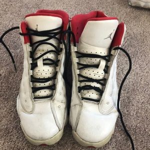 white and red jordan shoes